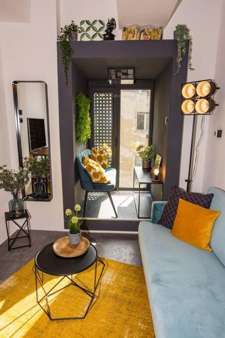 Happy Loft - Colorful Industrial Studio, fast internet, near main station - Tap to explore photos