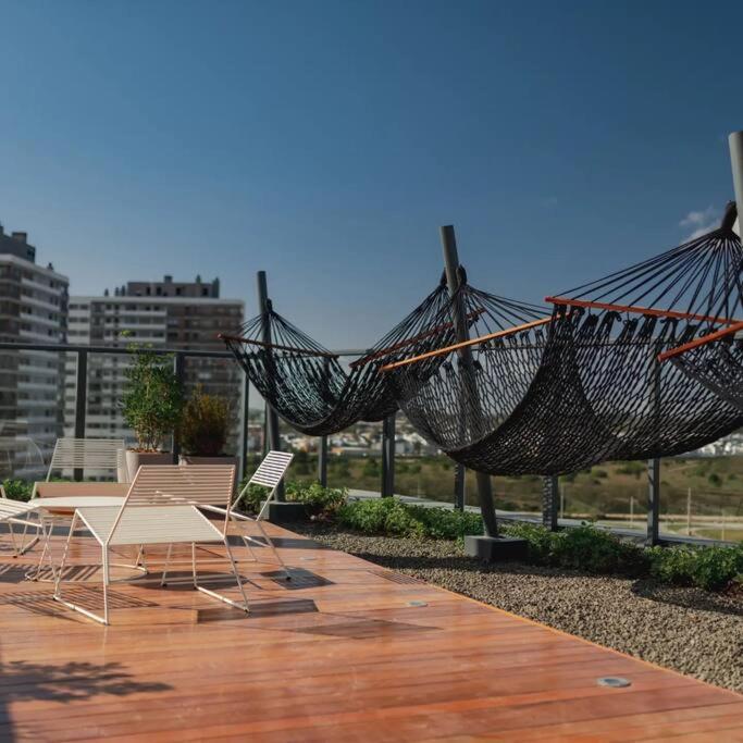 Loft com sacada, lareira e garagem no Parque Una photo 3
