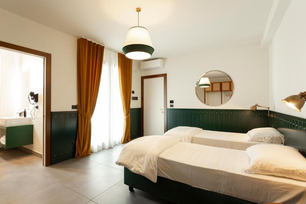Hotel Ghalà - Tap to explore photos