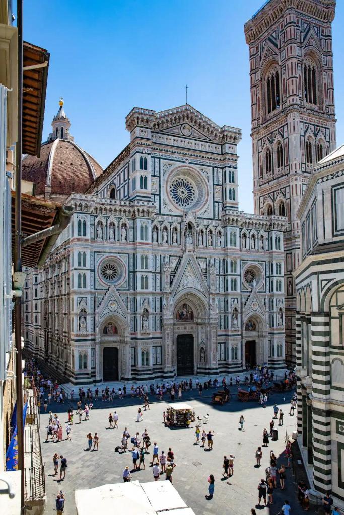Serene Gem In Front of Duomo - Tap to explore photos