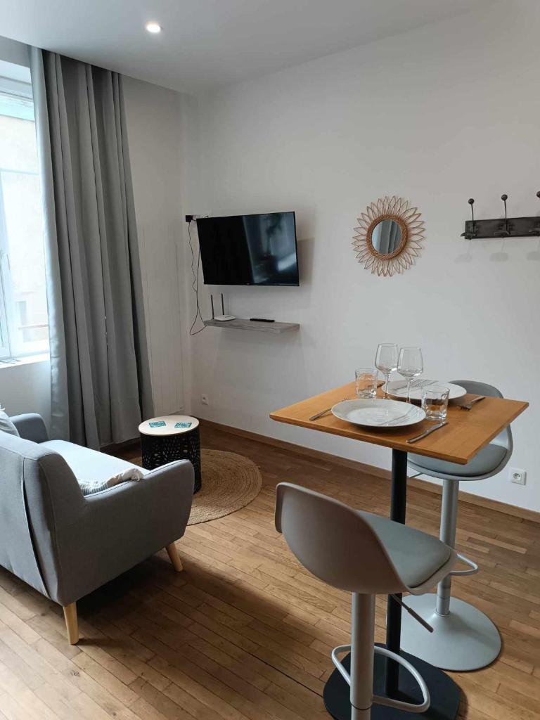 Logement cosy hypercentre photo 1