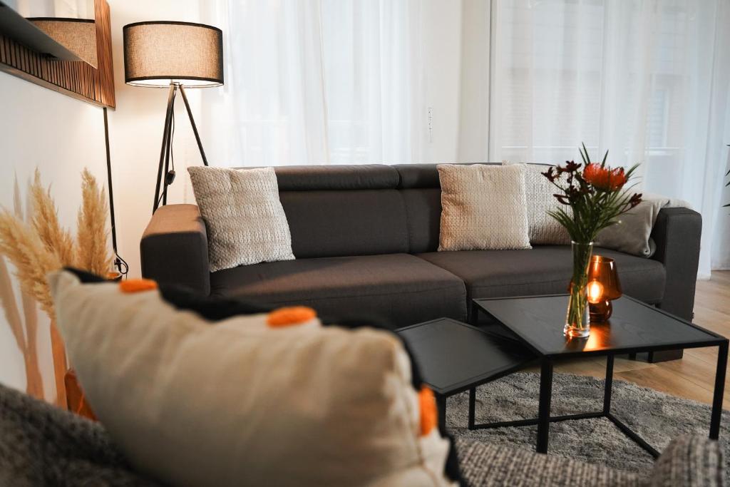 Stadtoase Wohnträumerei- Moderne Design Wohnung mit Ruhegarantie und gemütlichem Kamin in urbanem Ambiente photo 3