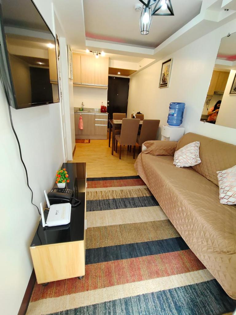 Rj condotel @arezzo place davao