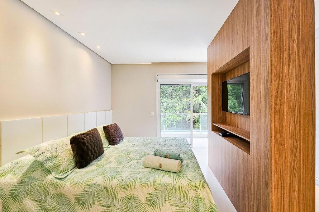 Casa de 400m² com 4 suites e piscina em Riviera photo 4