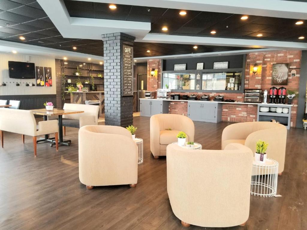Merit Hotel & Suites photo 2