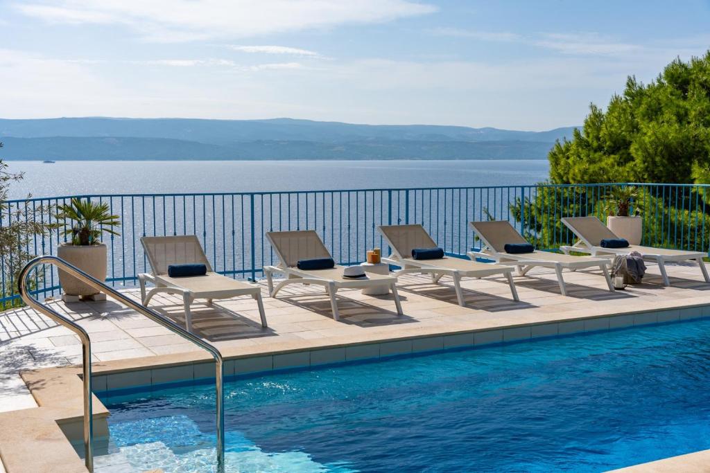 Seafront Villa Azzurro with heated pool photo 1