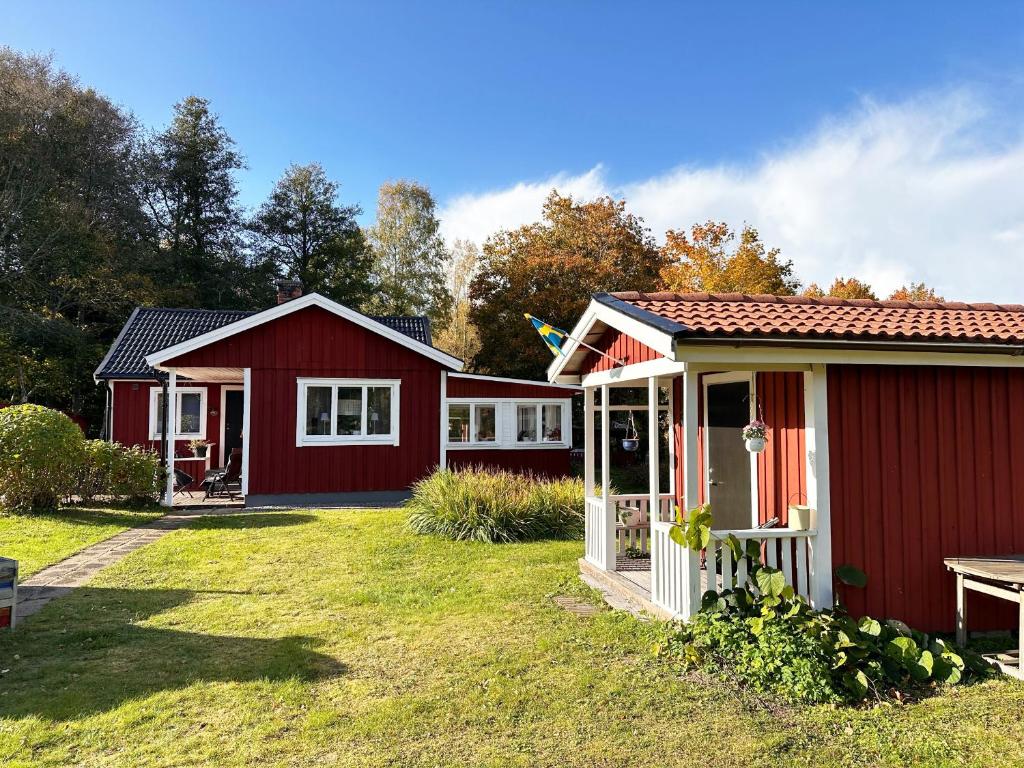 Nice red cottage near the lake Hjalmaren and Vingaker photo 1