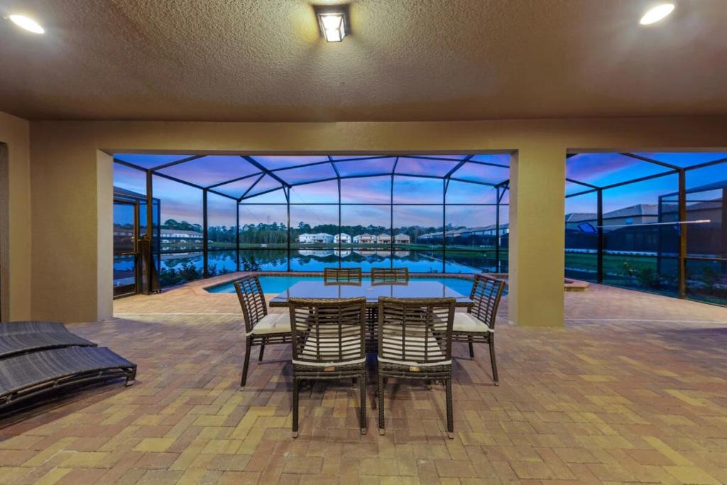 Indulge in a Lakefront Retreat 9 Bedrooms and World-Class Amenities image