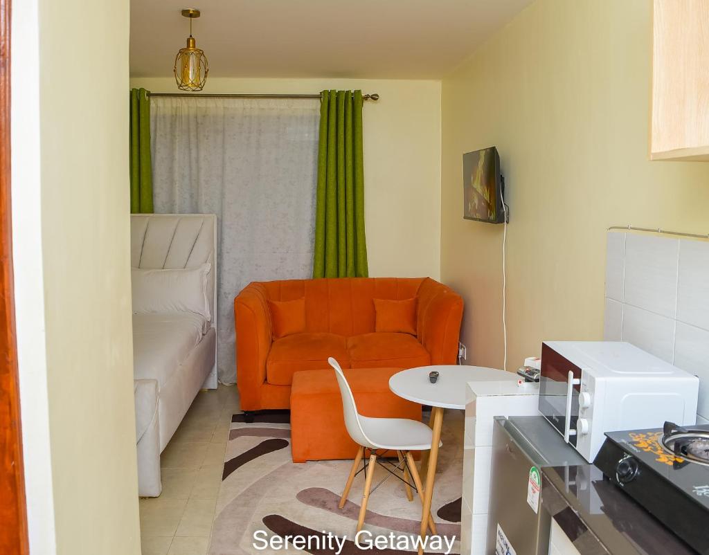 Serenity Getaway STUDIO apartment near JKIA & SGR with KING BED, WIFI, NETFLIX and SECURE PARKING photo 4