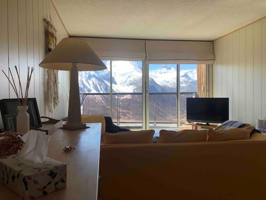 Appartement traversant 4 pers pied des pistes vue imprenable balcon et parking privé couvert photo 1