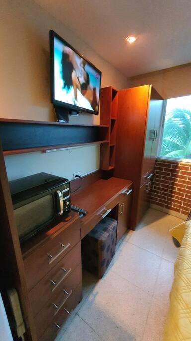 R.1101 Lindo estudio ejecutivo, privado y céntrico. photo 2