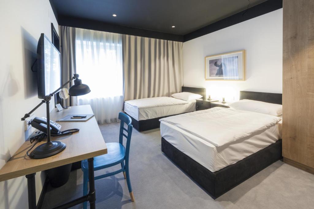 Двухместный (Двухместный номер с 2 отдельными кроватями), The Loop Hotel