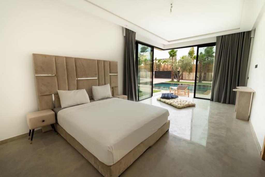 Villa Design à Marrakech - Tap to explore photos