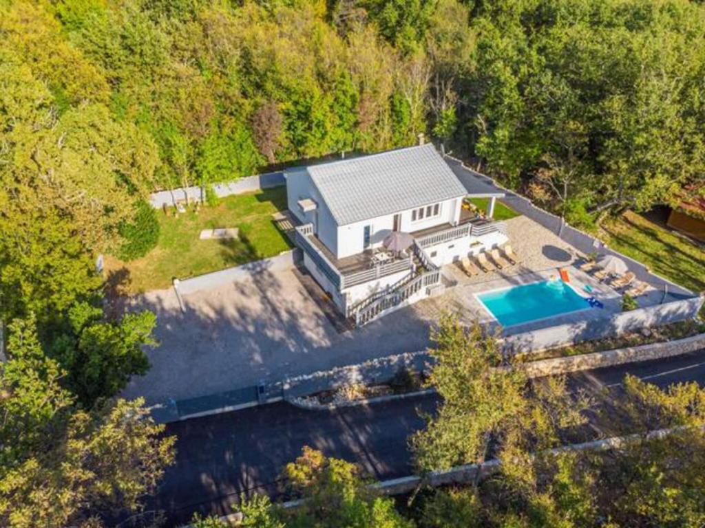 Adorable villa with pool and terrace surrounded by nature photo 1