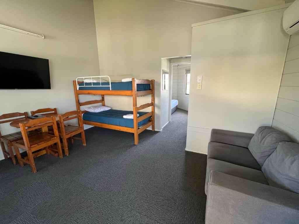 Shelly Beach Holiday Park - Tap to explore photos
