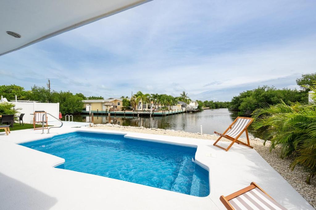 4BR Sombrero Beach House on Canal w Dock & Pool image