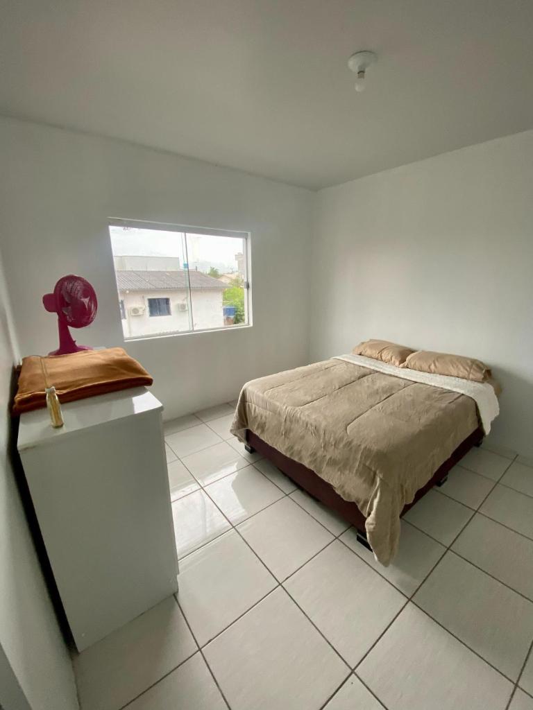 Apartamento no centro com suíte photo 2