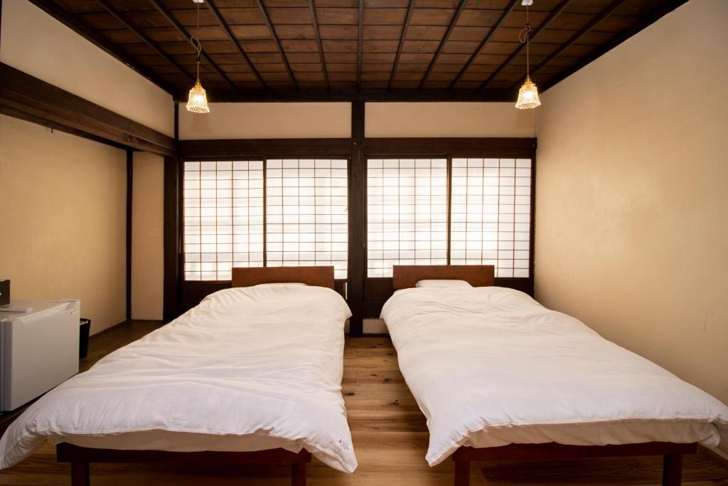 GLOCE西会津 ふくの屋 l 古きを知り新しきを愉しむ l 築110年超の古民家が綴る心地よい宿 photo 3