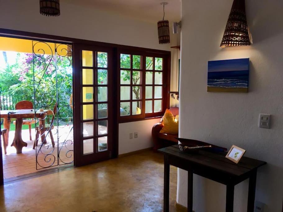 Apartamento com jardím e vista por rio, farol e mar photo 1