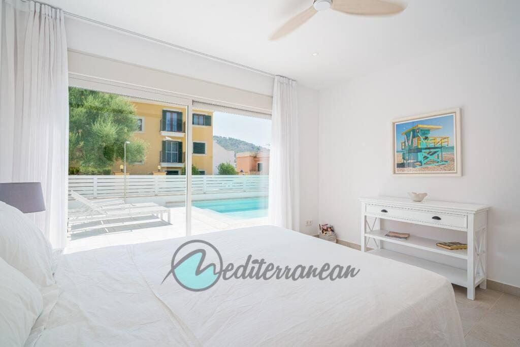 White Villa of the pier Port Andratx by villasmediterranean photo 1