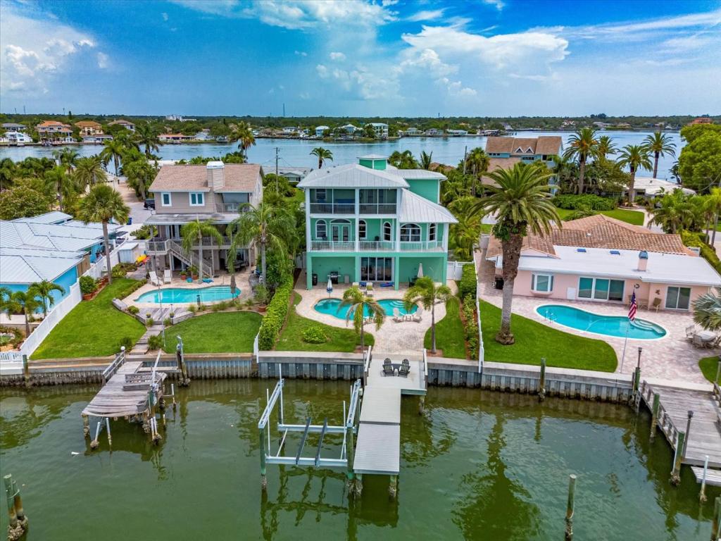 Waterfront Luxury w/ Heated Salt Pool & Golf Cart photo 2