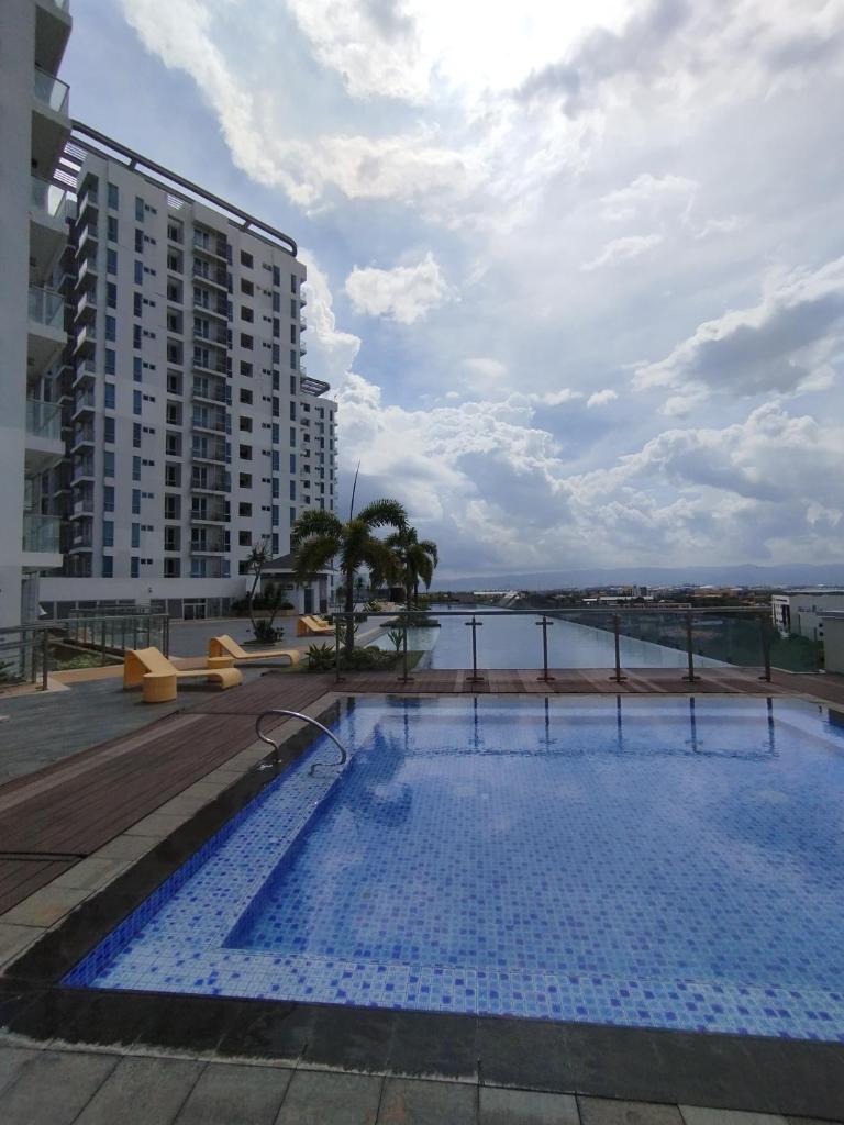 Mactan Newtown Beach Condo by FJCIVO photo 1