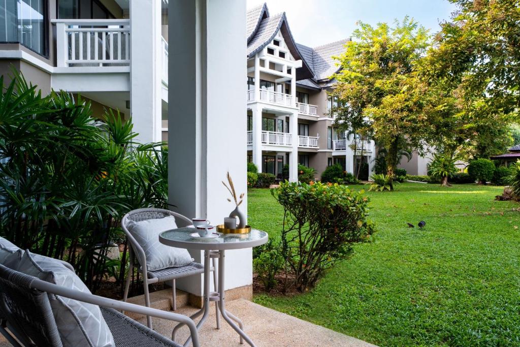 Allamanda Residences 2 BR with terrace Golf court view by NLA