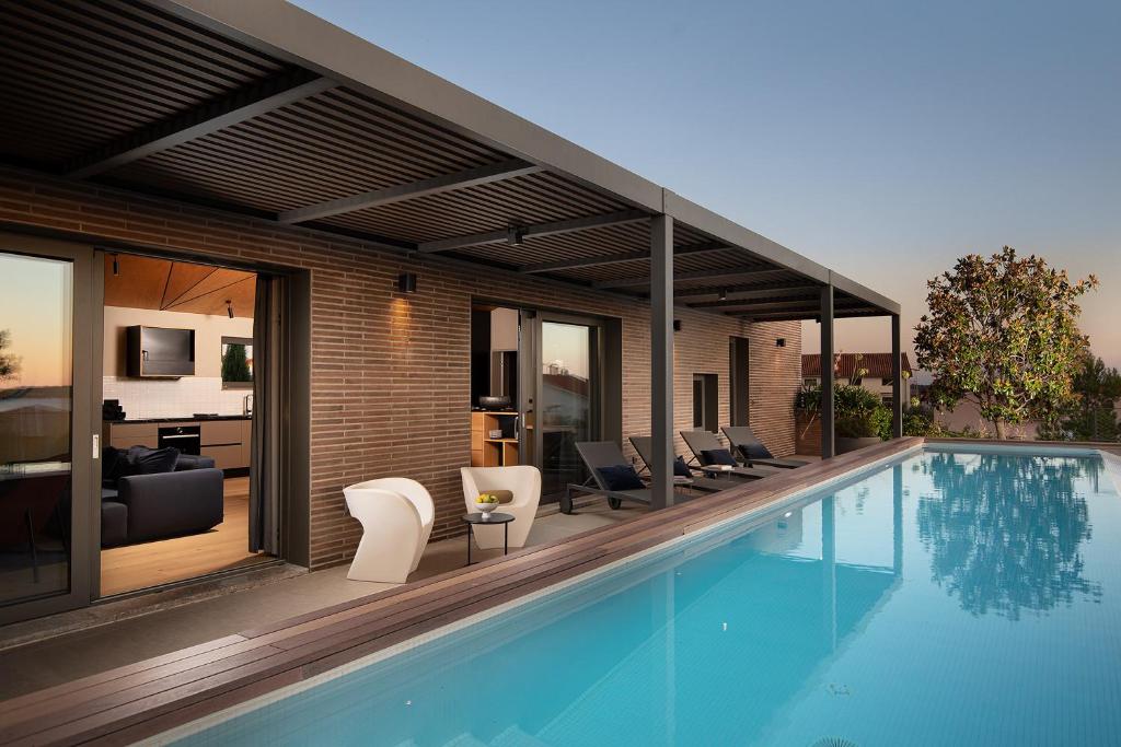 Casa Arbor Blanco in Fazana with heated pool, sauna & sea view only 500 meters from the beach photo 1