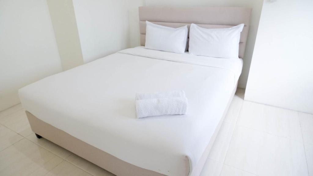 2BR Apartment at Puncak Bukit Golf Surabaya near Lenmarc Mall By Travelio