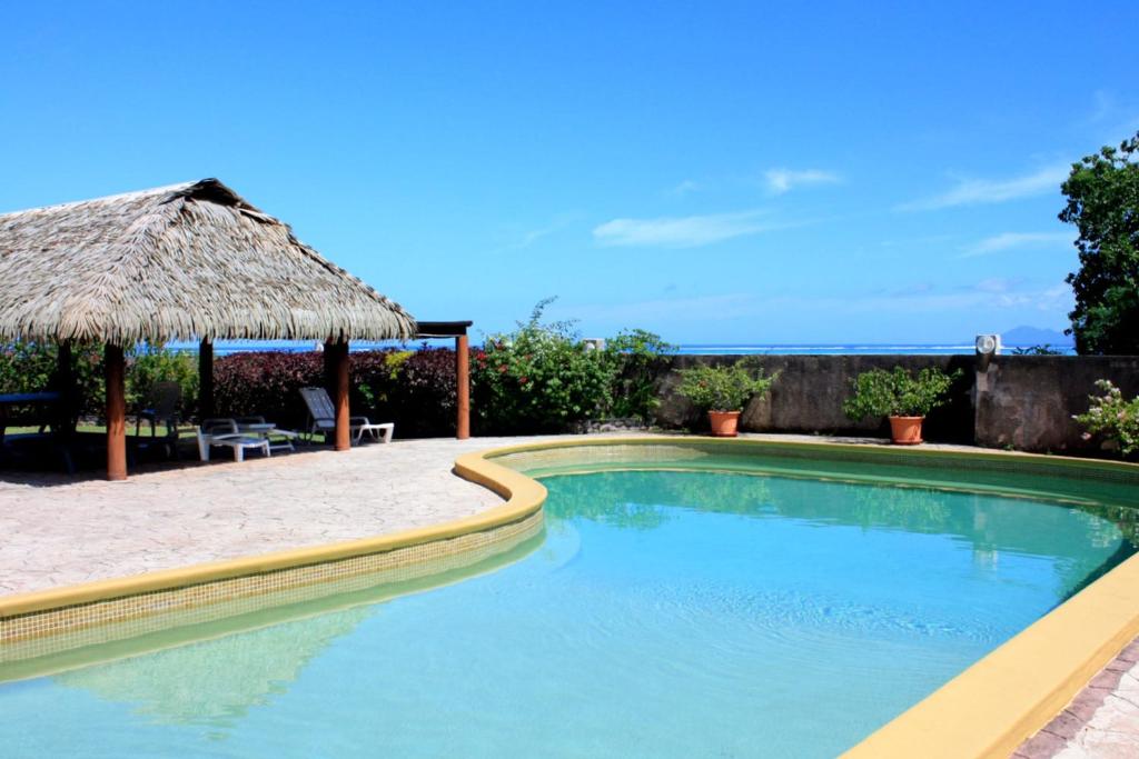Arahea Lagoon flat beachfront with pool facing the sunset Wi-Fi - AC photo 1