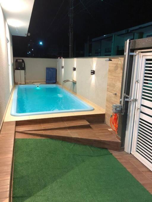 2 suítes ar piscina ar cond. photo 3