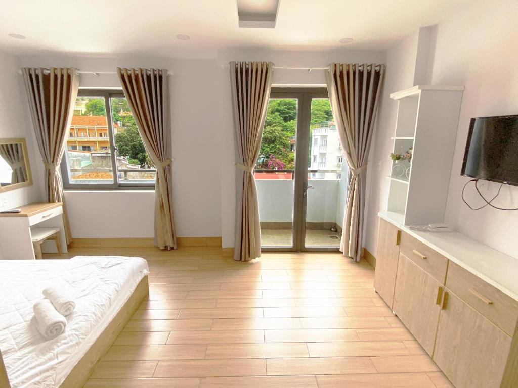 Jolilian Hotel & Apartment