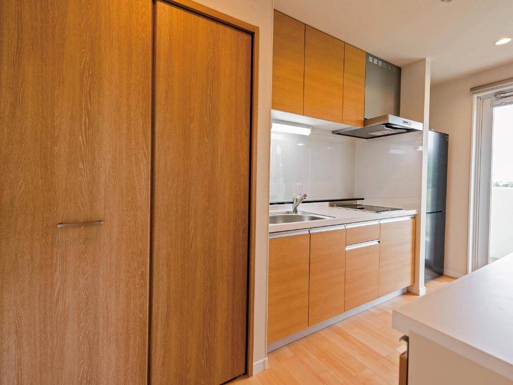 Private Condo Chatan Jagaru by Coldio Premium - Tap to explore photos