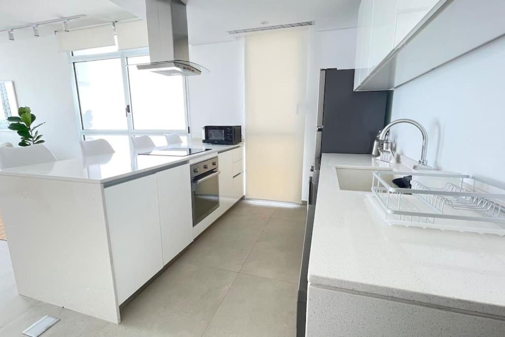 Amchit Bay Beach Residences 2BR Rooftop photo 3
