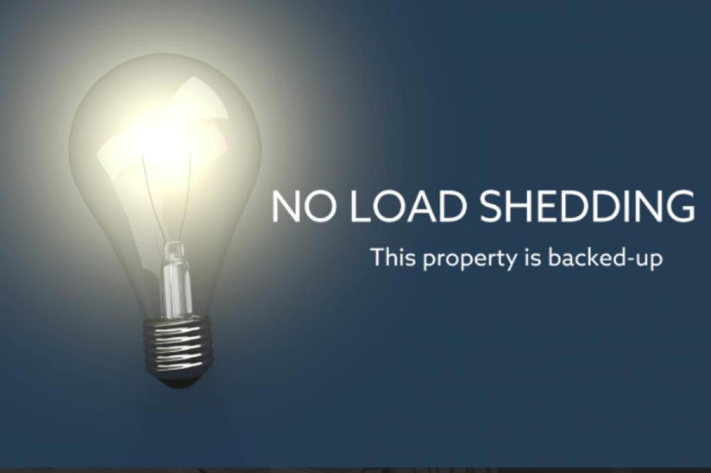 Load-Shedding Free 2 Bedroom Beachfront Apartment with Sea Views photo 2
