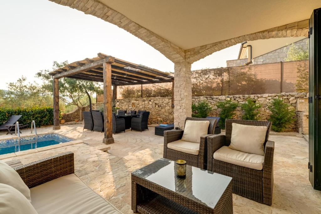 New villa with swimming pool, olive grove and sea view by Traveler tourist agency Krk ID 2201 photo 4