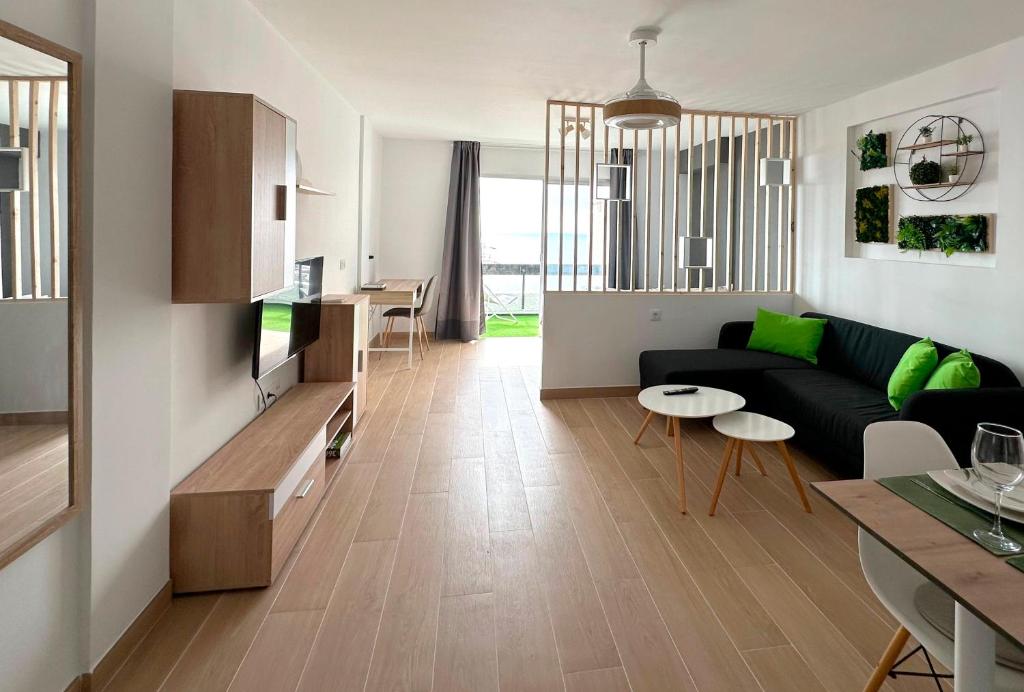Modern open-plan studio with terrace and sea view photo 3