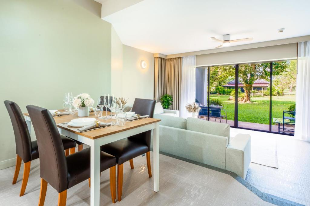 Allamanda Residences 2 BR with terrace Golf court view by NLA photo 3