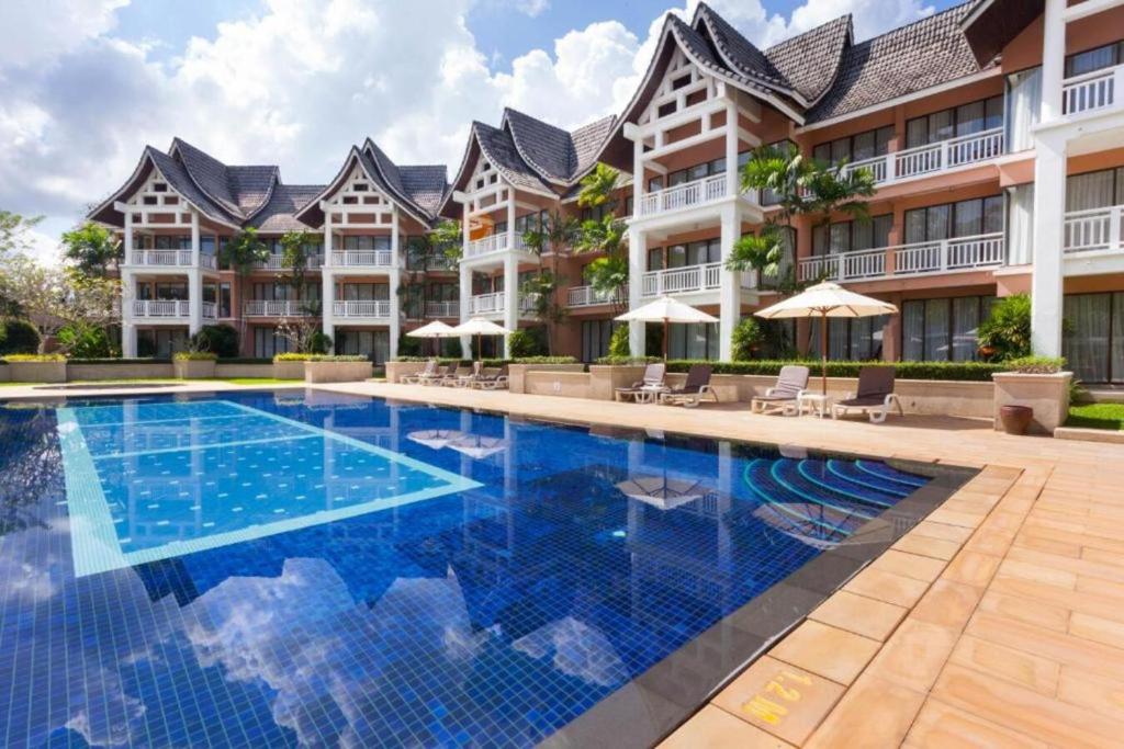 Allamanda Residences 2 BR with terrace Golf court view by NLA photo 1