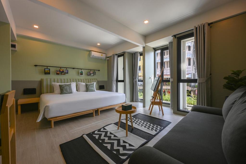 Chamemon Bed Phuket Town - Tap to explore photos