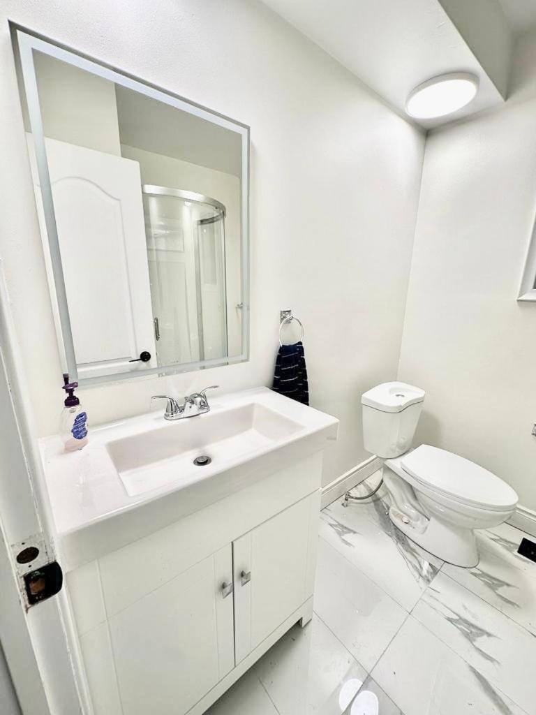 Main floor Room with Queen Bed, Free Parking and Free wi-fi and shared washroom near Fairview Park Mall (Room 2) photo 1