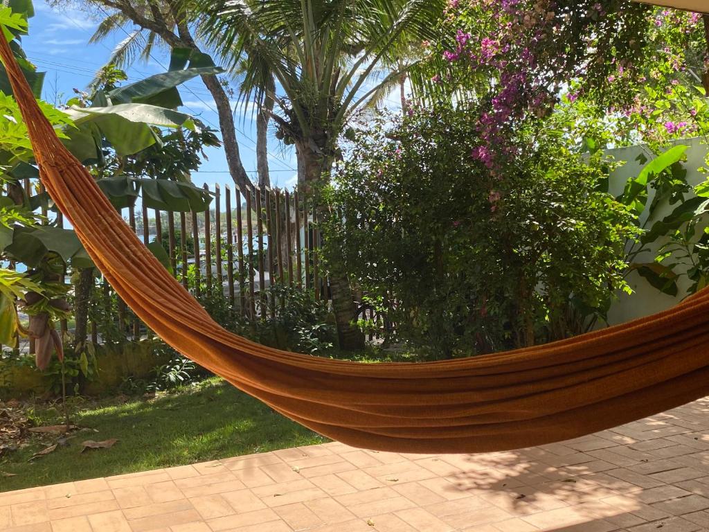 Apartamento com jardím e vista por rio, farol e mar