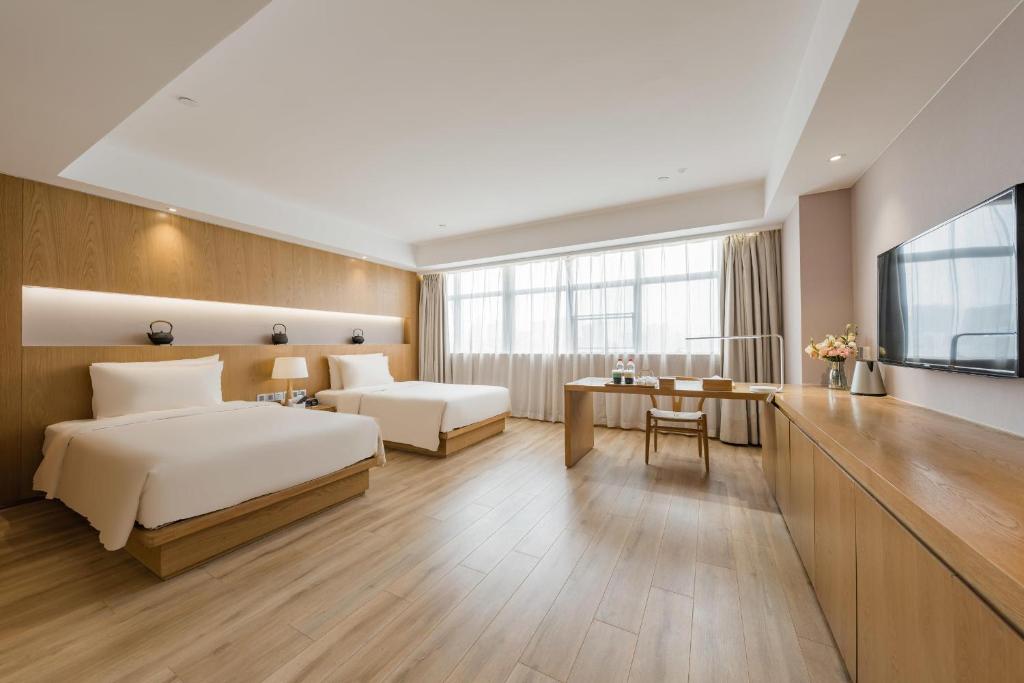 Atour X Hotel Wuxi New Zone Gelunbu Plaza photo 1