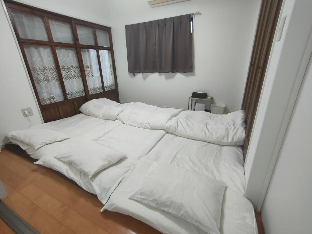 佐世保　貸切小さな一軒家　GUEST HOUSE　楽楽 Luck-Luck photo 1