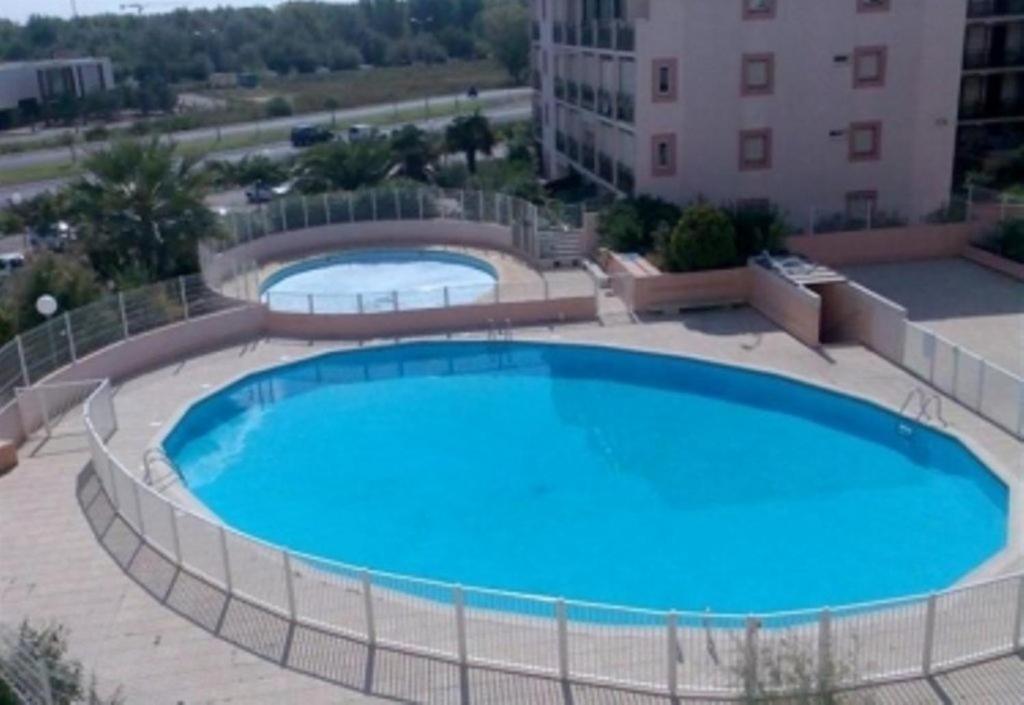 AS24000 - Studio cabine avec parking, wifi , clim et piscine photo 1