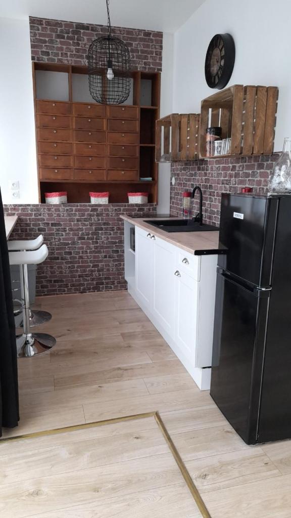Gîte location meublée Aumale - studio en centre-ville - La maison en brique photo 2