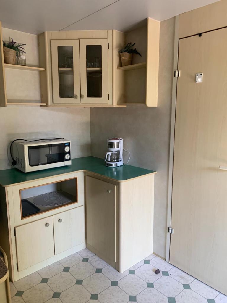 Comfortabele familie chalets met veranda incl airco dichtbij zee! photo 4