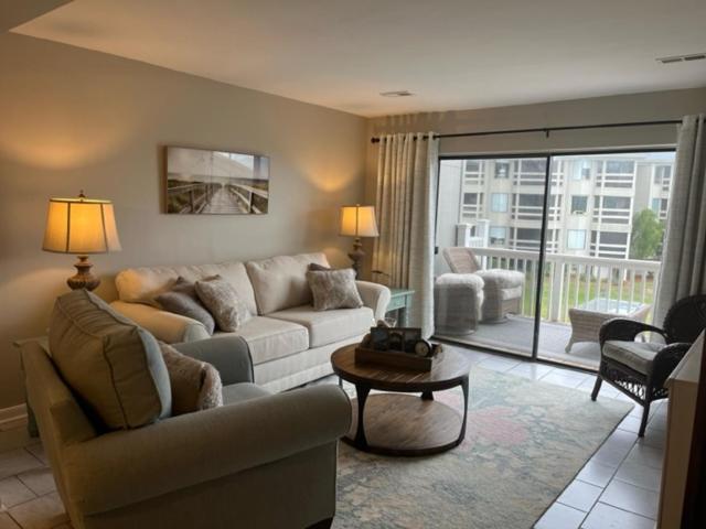 NEW LISTING! Centrally Located with Pool and Beach Views image