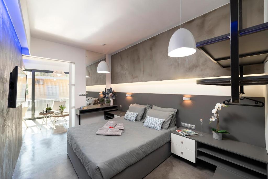 Erasmia Beachside Suites - Tap to explore photos