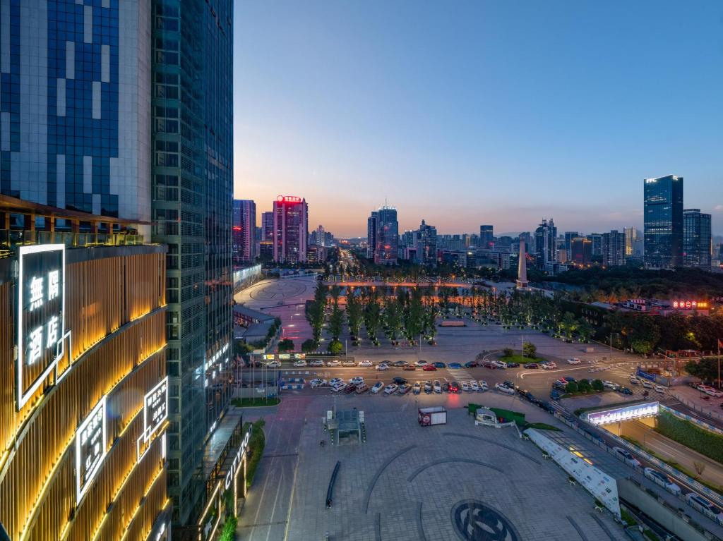 Wuyu Hotel - Chongqing Liangjiang Happiness Plaza photo 1